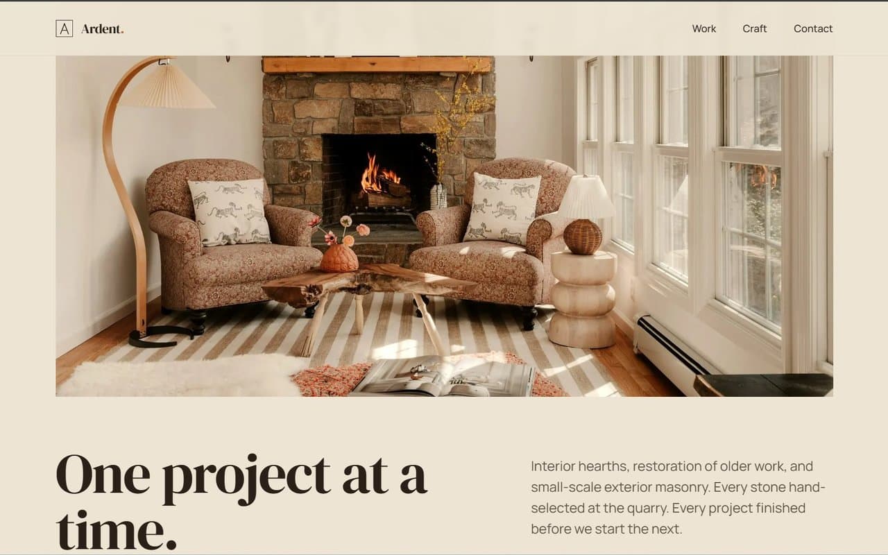 Ardent Stone & Tile homepage — fieldstone hearth flanked by upholstered armchairs in a sun-filled room, headline reads "One project at a time."